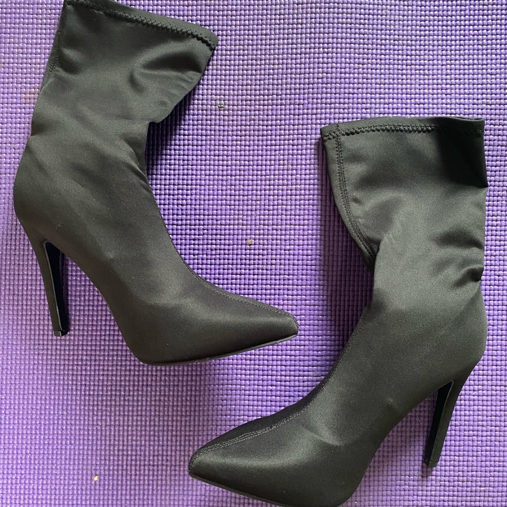 Sleek black High heel above ankle boots